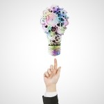 hand pointing to bulb